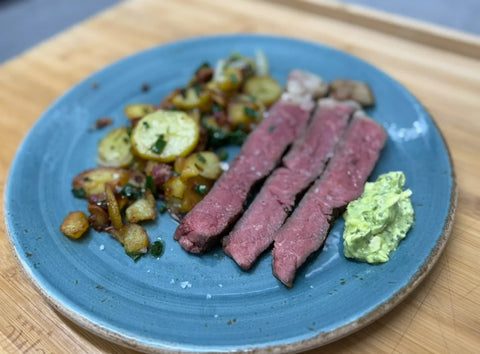 T-Bone-Steak mit Bratkartoffeln und Speck